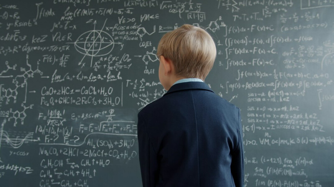 Researcher writing statistical formulas on a whiteboard