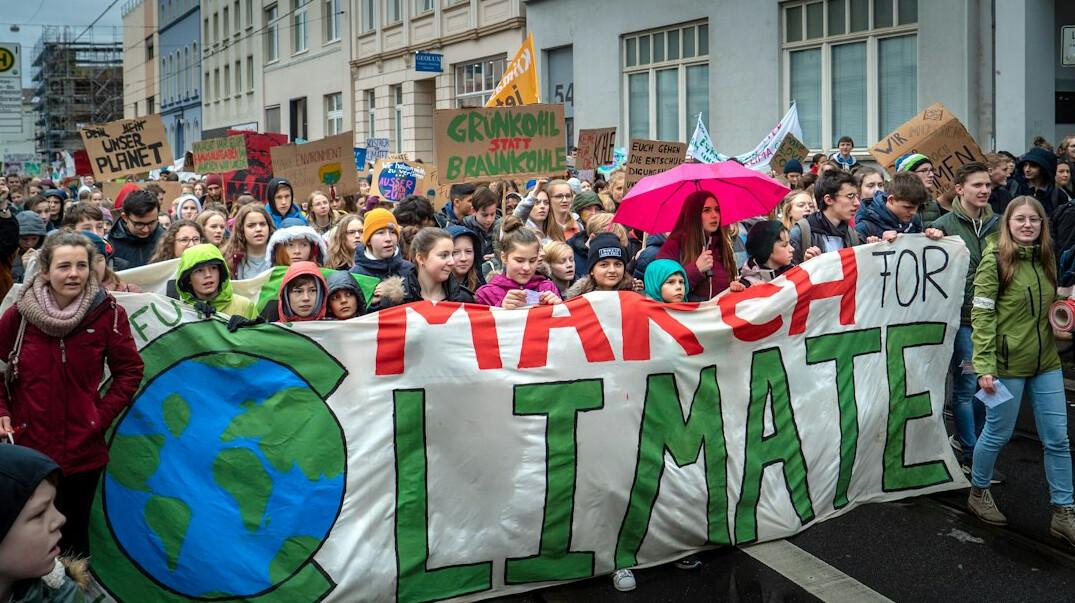 climate protest march with banners