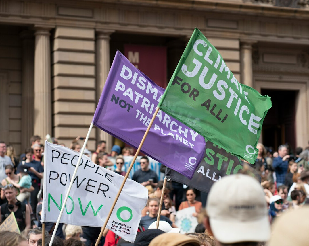 climate protest march with banners